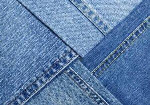 Blue denim jeans texture background e1587573747521