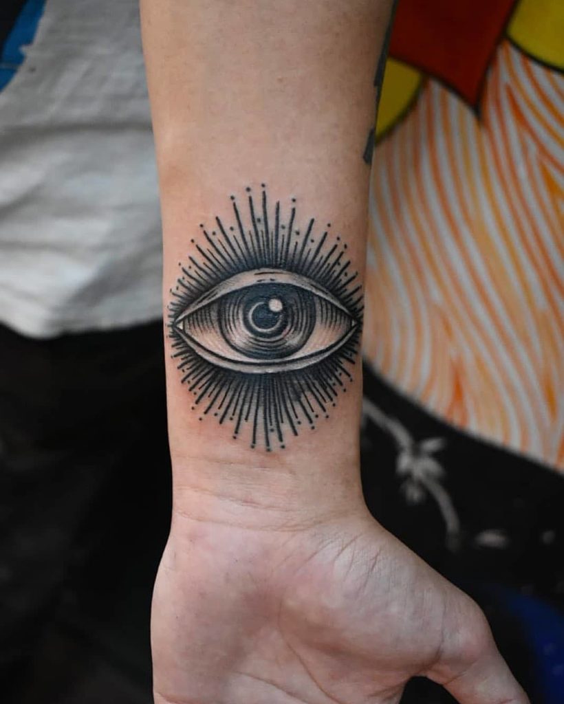 Illuminati dövme bileği